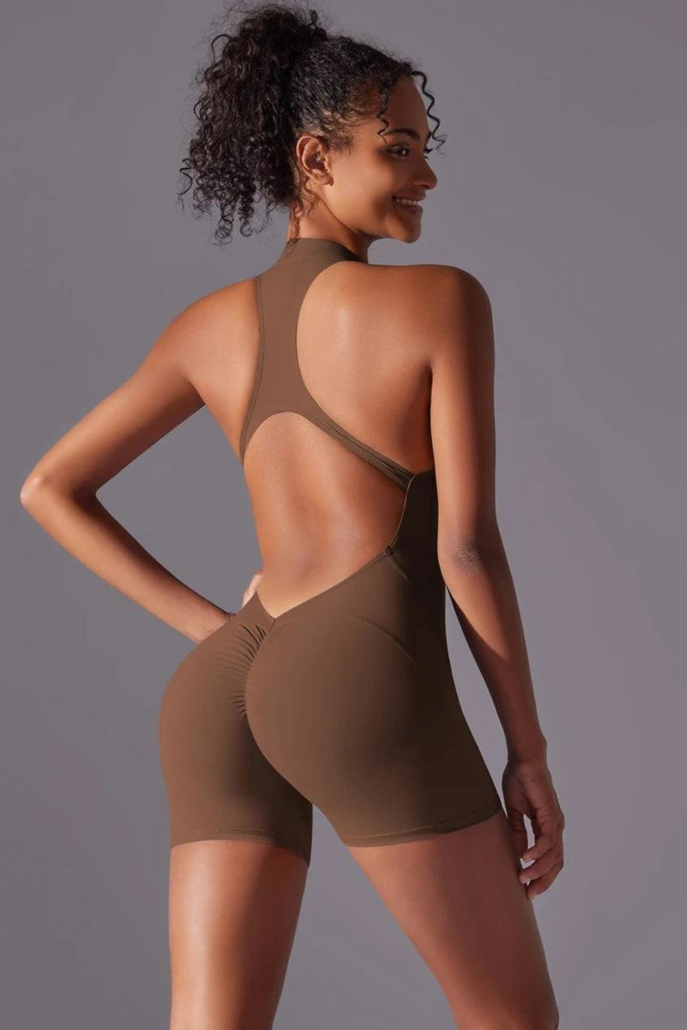 Macaquinho Fitness Feminino Zíper Frontal, Manga Curta e Costas Abertas Nuudi Store Nuudi Store